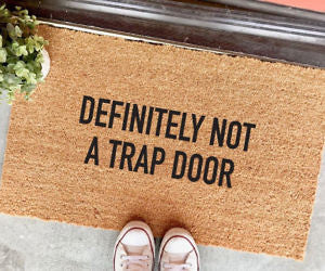 Definitely Not A Trap Door Doormat